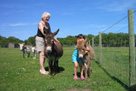 Faith and Gretta, with Flakey and Smartie in the background